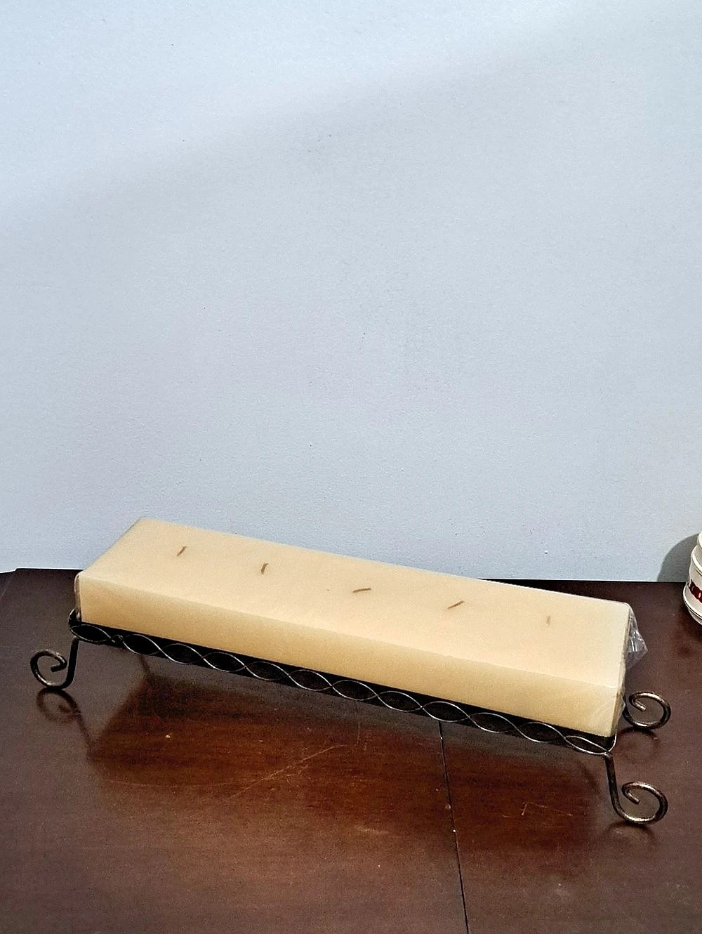 Long Rectangular Center Piece Multiple Wick Candle In A Metal Scrollwork Stand